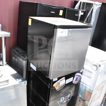 Seven mini coolers, including Galanz and Hisense brands, 115 volts, 1 phase; exterior labels include brand markings.