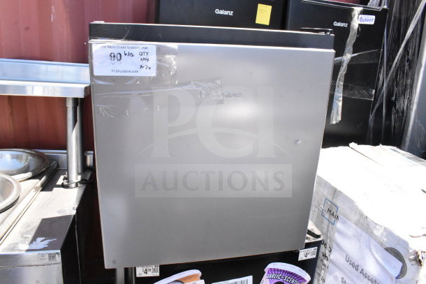 Seven mini coolers including Galanz and Hisense models, 115 volts, 1 phase. Labels indicate auction details.