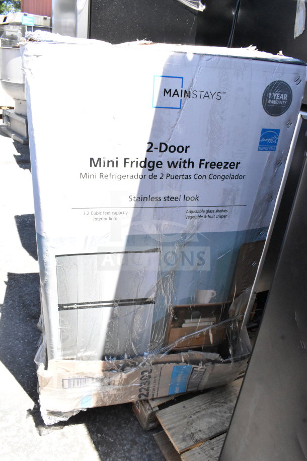 Packaging of Mainstays 2-Door Mini Fridge with Freezer, stainless steel look, 3.2 cu ft capacity, Energy Star label.