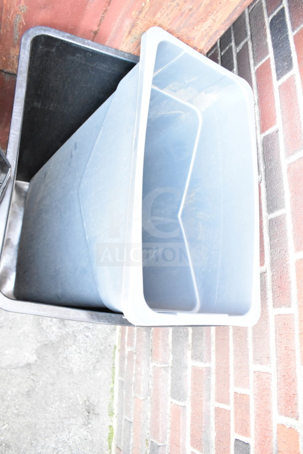 Three stackable plastic trash cans, assorted colors, used condition, suitable for indoor or outdoor use.