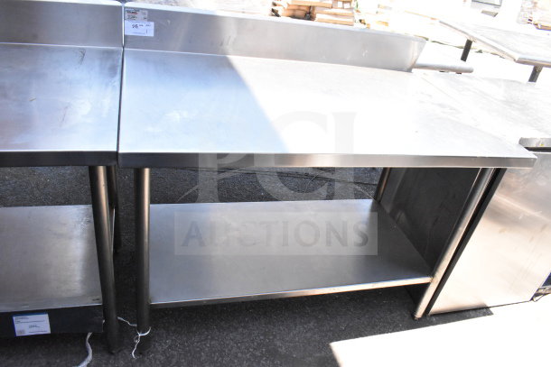 Winholt commercial table with backsplash and under shelf, stainless steel, good condition, visible product tag and markings.