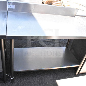 Winholt commercial table with backsplash and under shelf, stainless steel, good condition, visible product tag and markings.
