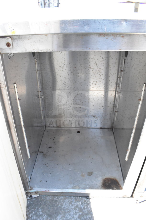 Perlick Commercial 4 Door Back Bar Cooler, stainless steel, missing 2 doors, some interior wear, ideal for bar use.