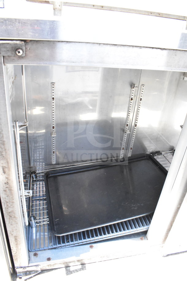 Perlick Commercial 4 Door Back Bar Cooler, missing 2 doors, showing interior shelving, slightly worn condition.
