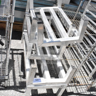 Five metal dunnage racks stacked, in good condition, lot number 141 visible. Auction item: 5 racks at bid times five.