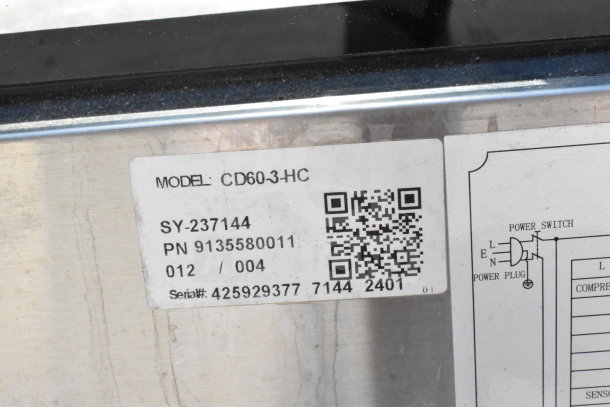 Precision CD60-3-HC deli display case tag showing model, serial number 425929377, and electrical schematic.