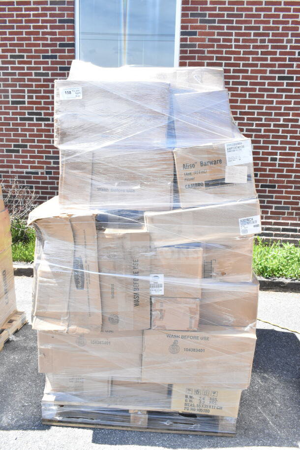 Pallet with 45 scratch and dent items, including platters, glasses, and bins, wrapped in plastic, showing box labels.