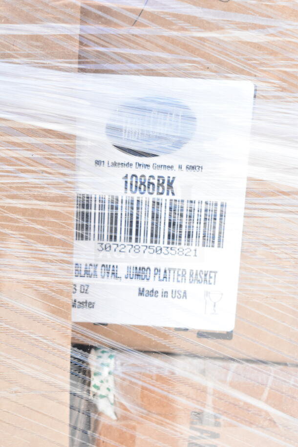 Plastic-wrapped pallet with "1086BK Black Oval Jumbo Platter Basket" label, made in USA.