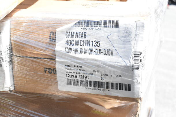 Stack of boxed Camwear 40CWCHN135 food pan lids, labeled for sale, clear color, case quantity of 6, brand new condition.