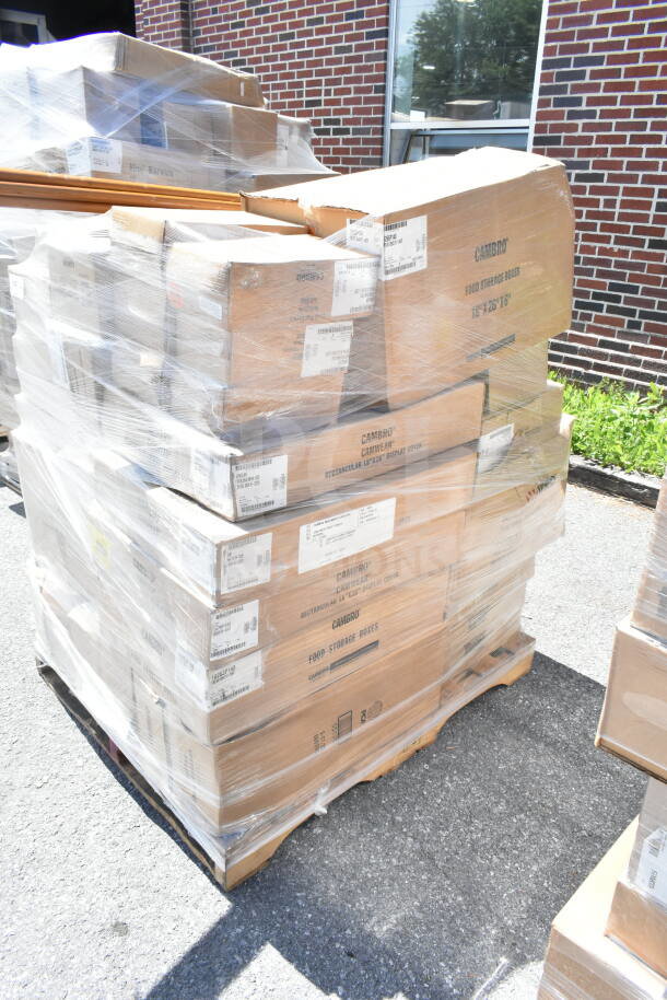 Pallet of boxed items including Camwear food pan lids, Round Lids, Winco sugar pourers, wrapped for auction.