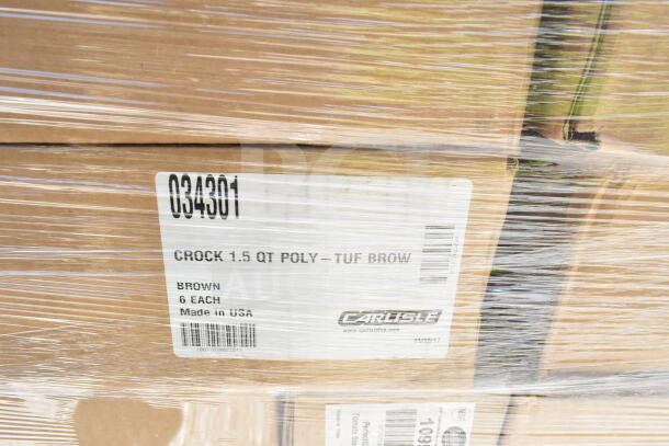 Packed boxes labeled "034301 Crock 1.5 Quart Poly," 6 each, brown, by Carlisle, new in wrap. Part of scratch and dent auction.