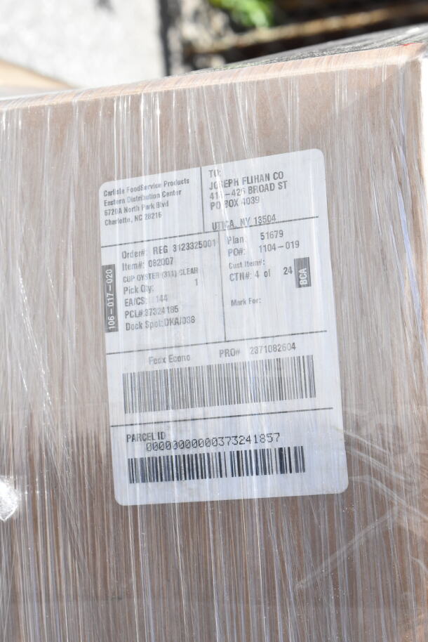 Box with shipping label, wrapped in clear plastic. Contains scratch and dent items, includes Carlisle bowls, tumblers, tongs, lids.