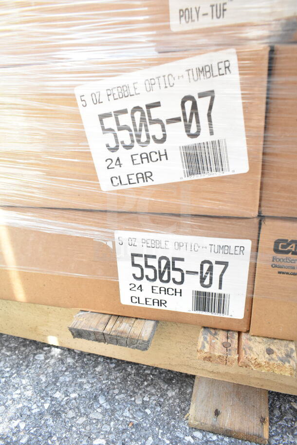 Boxes labeled "5505-07 Pebble Optic Tumblers, 5 oz, 24 each, clear," on a pallet, wrapped in plastic for shipment.