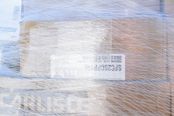 Wrapped and labeled boxes with Carlisle branding, containing assorted scratch and dent items: bowls, tumblers, tongs.