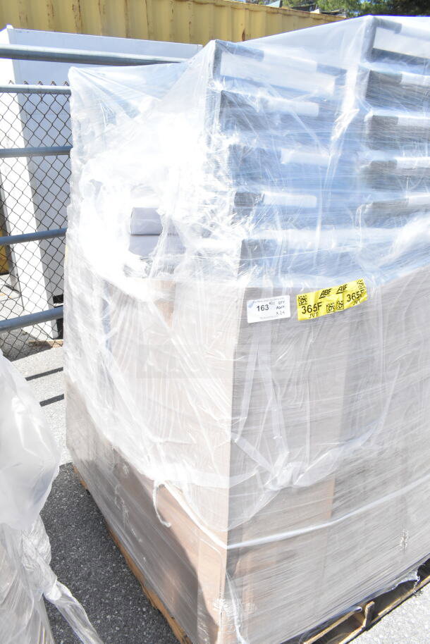 Pallet wrapped with 24 new Lancaster banquet chairs, black vinyl, silver vein frame, visible labels "365F" and "MAY26-156".