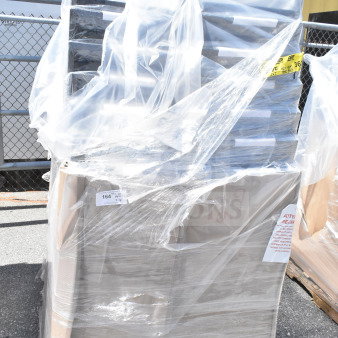 28 new Lancaster Table & Seating banquet chairs, scratch and dent, in packaging. Black vinyl, silver vein frame.