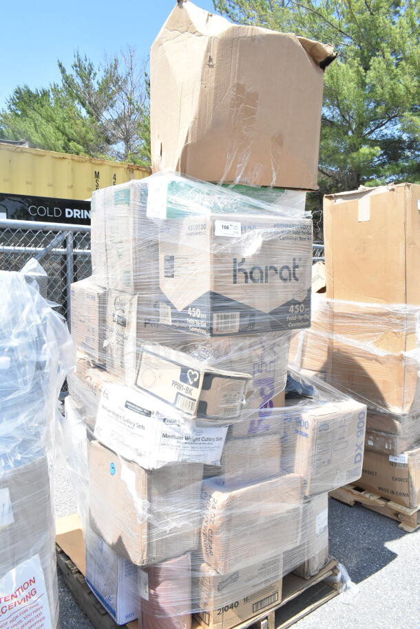Pallet of assorted items including Karat boxes and cutlery sets, mostly new, with some boxes showing minor damage.