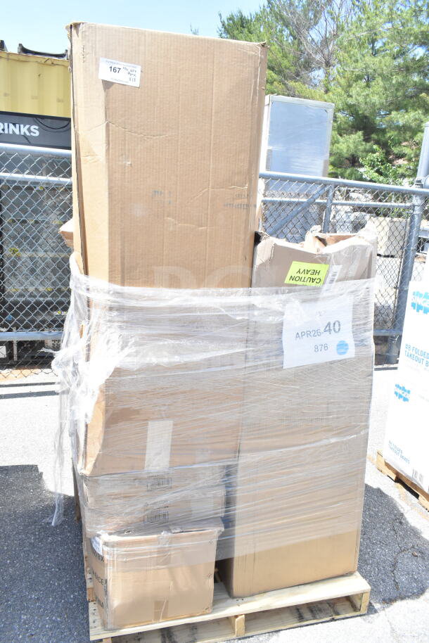 Pallet with 13 brand new, scratch and dent items wrapped in plastic. Visible label reads "APR26-40 876," marked "Caution Heavy."
