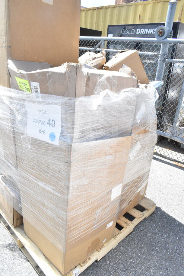 Pallet with 13 sealed cardboard boxes labeled "Scratch and Dent" and "APR26-40," indicating auction batch.