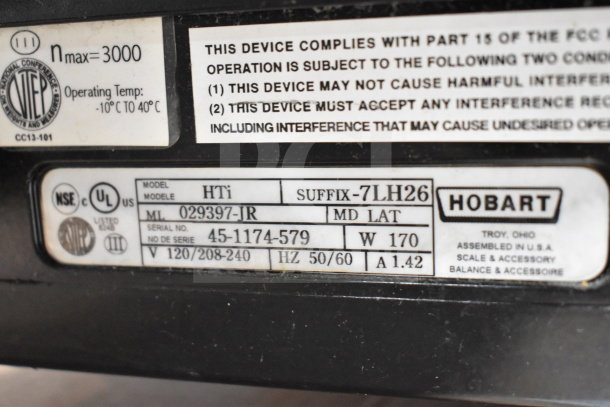 2017 Hobart HTi-7LH26 commercial food scale label, showing model, voltage, and compliance details.