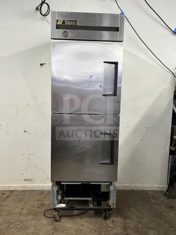 TRUE T-23-2, 27" reach-in refrigerator with two left-hinge solid doors, model T-23-2, used, 115V, good condition.