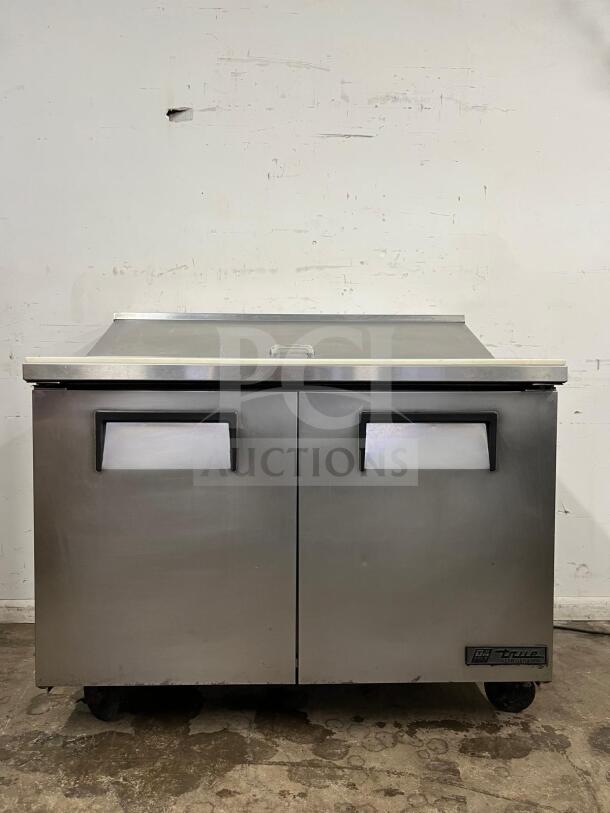 True TSSU-48-12-HC stainless sandwich salad prep unit, 12 CuFt, holds twelve 1/6 pans, dual-door, excellent condition.