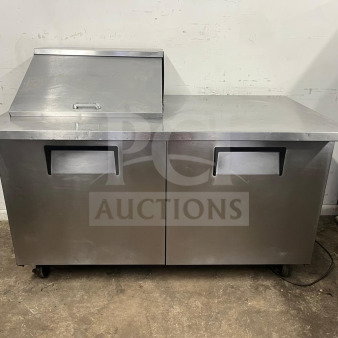 True TSSU-60-12M-B-HC 2 Door Mega Top Sandwich Prep Table with 12 Pans, stainless steel, excellent condition.