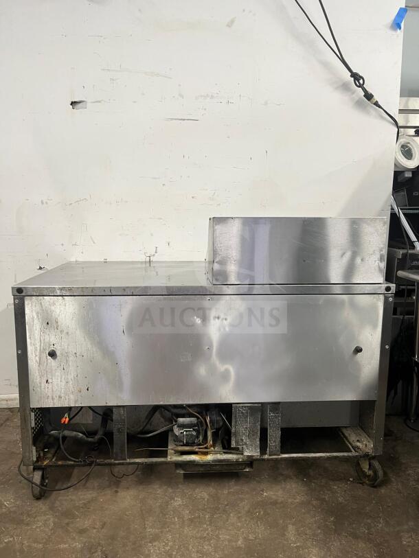 True TSSU-60-12M-B-HC 60 3/8" refrigerated sandwich prep table. Two doors, 12 pans. Visible wear, functional condition.
