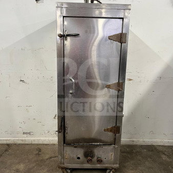 Universal Smoker Oven, stainless steel, galvanized interior, 3 burners, 78", visible rust, on wheels, commercial use.