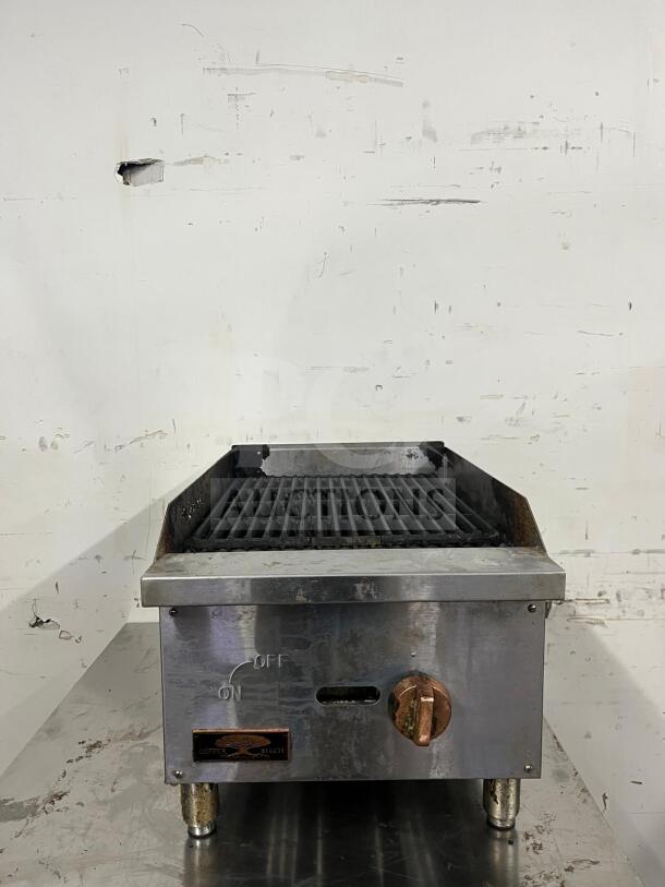 Star-Max Countertop 15in Radiant Gas Charbroiler in stainless steel, with adjustable knobs, showing signs of use. Model: Charbroiler.