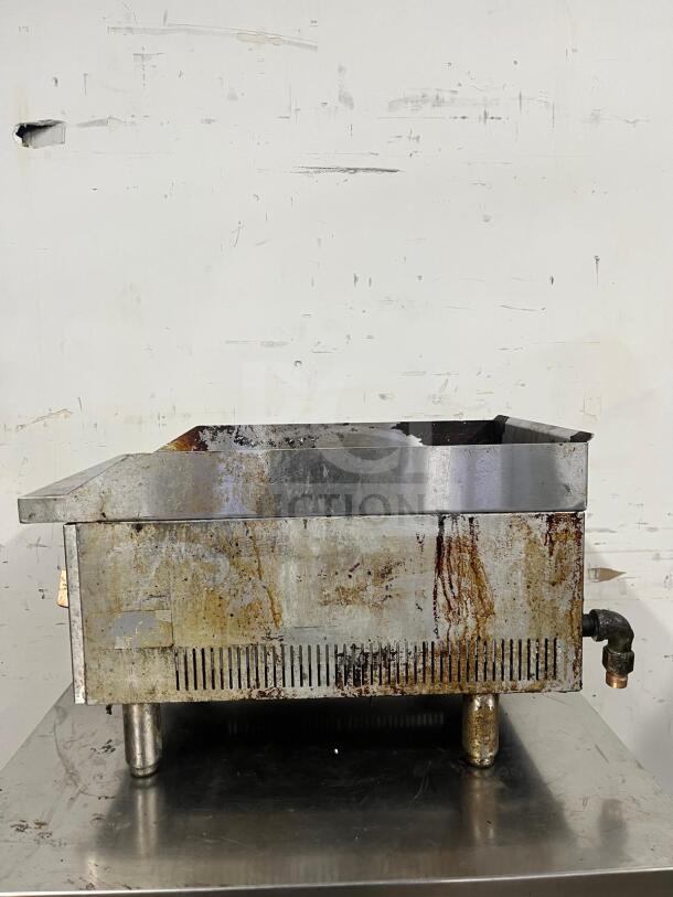 Star-Max Countertop 15in Radiant Gas Charbroiler with visible wear and stains, metal exterior, and control valve.
