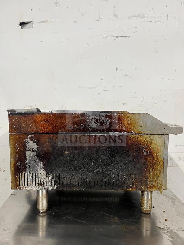 Star-Max countertop 15in radiant gas charbroiler, model Charbroiler, showing rust and wear. Perfect for restaurant use.