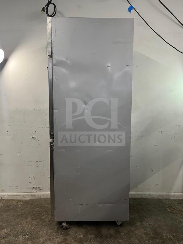 Beverage-Air HF1HC-1HS freezer, top-mounted, half solid door, 26", visible dents, scuffs; on casters, gray finish.