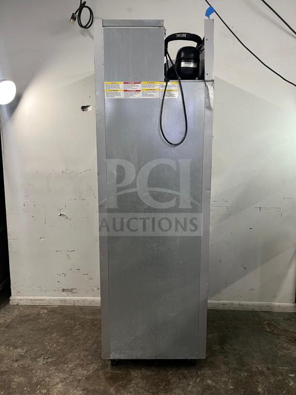 Beverage-Air HF1HC-1HS Horizon Series 26" freezer, half solid door, top mounted, gray, used, visible warning labels.