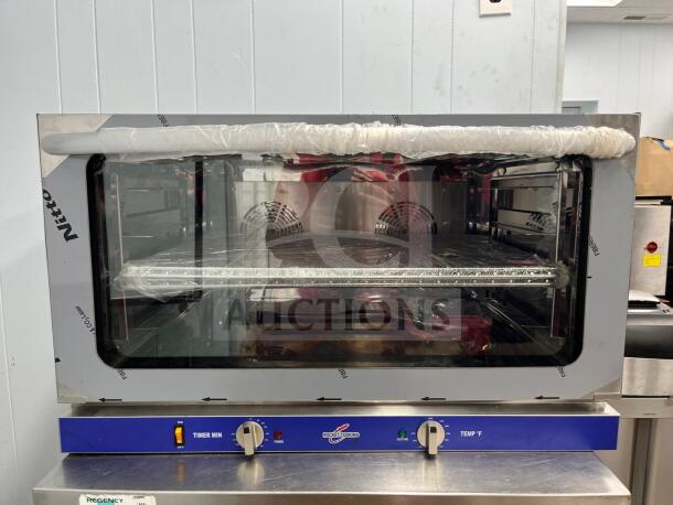 ROCKET ENCOV-38 Enhanced Convection Oven, full size, glass door, 208/204V, unused condition, visible dials for timer and temperature settings.