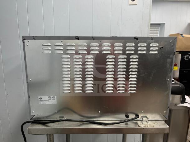 ROCKET ENCOV-38 enhanced convection oven, full size, back view, metal finish, power cord attached, model and compliance labels visible.