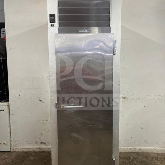 Traulsen G10010 30" reach-in refrigerator with solid right-hinged door, stainless steel, mounted on casters, in good condition.