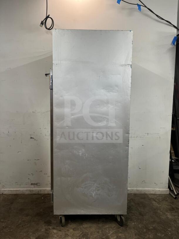TRAULSEN G10010 30" reach-in refrigerator with right hinged door, silver exterior, on casters. Used condition.