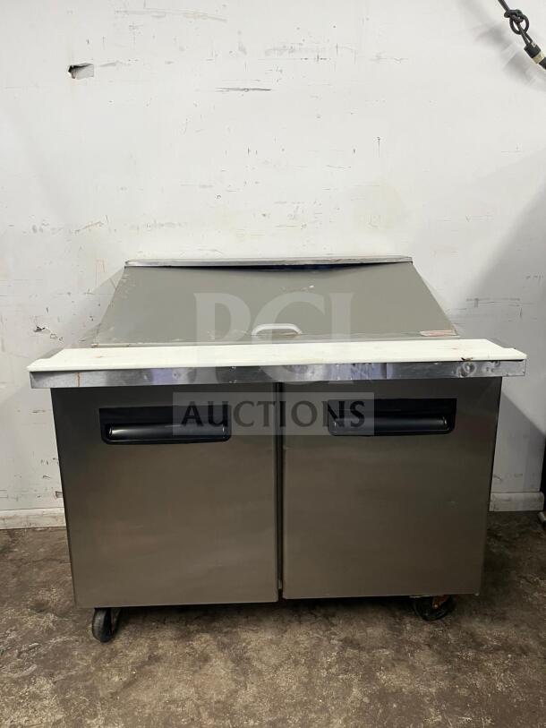 Blue Air BLMT48-HC 48" refrigerated mega top sandwich prep table, dual swing doors, 13.1 Cu. Ft., stainless steel, used.