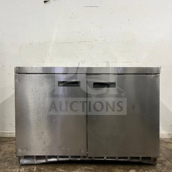 Delfield 4448NP-18M 48" refrigerated salad prep table, stainless steel, two doors, holds 18 pans, good condition.