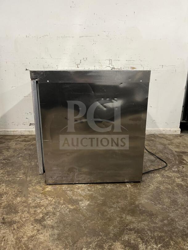 Delfield 4448NP-18M 48" refrigerated salad prep table, stainless steel, includes 18 pans, overall good condition.