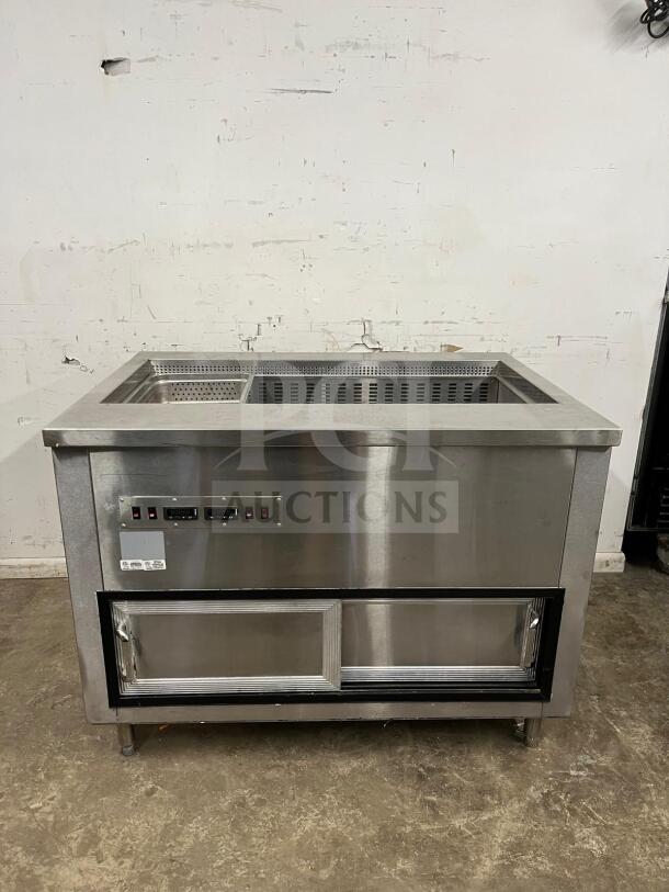 Stainless steel prep table with salad bar, excellent condition, integrated control panel, and dual access doors.