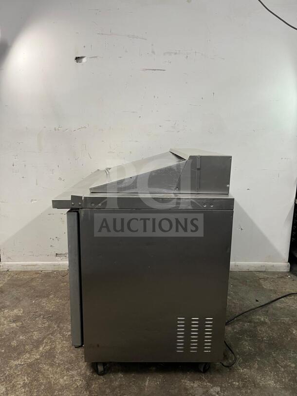 Kelvinator KCHMT48 48" sandwich/salad prep table, stainless steel, refrigerated base, side view. Used condition.