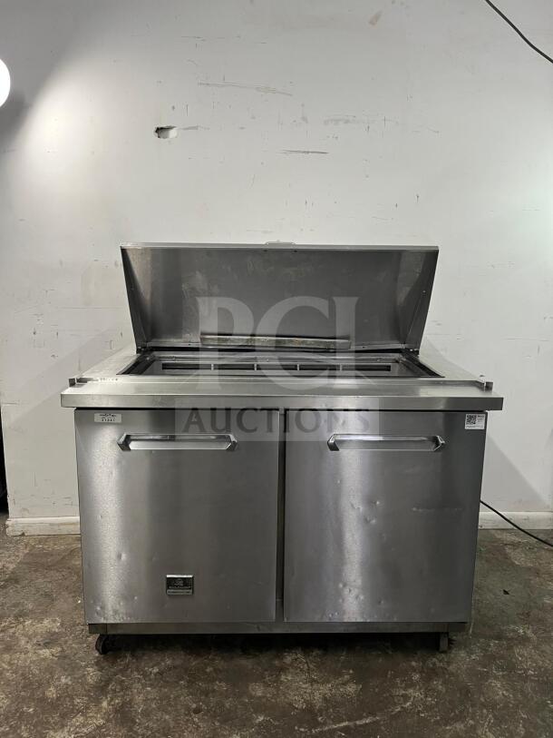 Kelvinator KCHMT48.18 48" prep table, stainless steel, refrigerated base, dual doors, used, visible wear. Model label present.