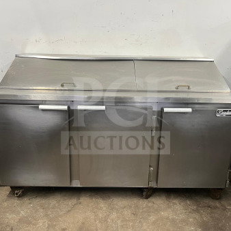 LEADER NSFM72 72" three-door refrigerated prep table for sandwiches and salads. Stainless steel, mega top design, good condition.