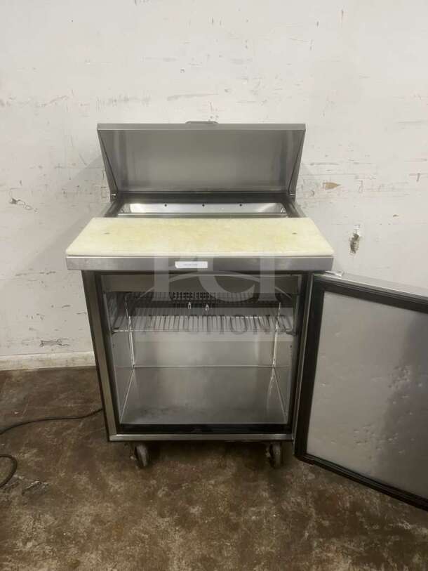 True TSSU-27-08-HC refrigerated sandwich prep table, right hinged door, cutting board, clean, good condition.