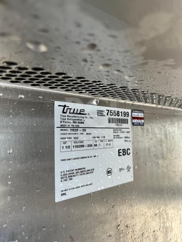 TRUE TR3F-3S-HC Spec Series 77 3/4" solid door reach-in freezer tag, model TE3F-3S, showing specs and serial number.