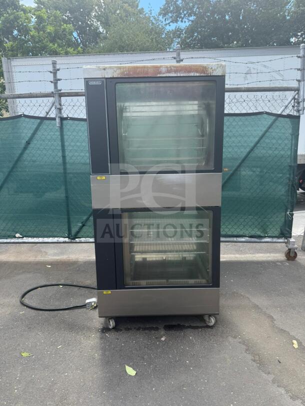 HOBART Electric Rotisserie Oven HRW 330, stainless steel, dual glass doors, visible wear on top, wheeled base, power cord included.