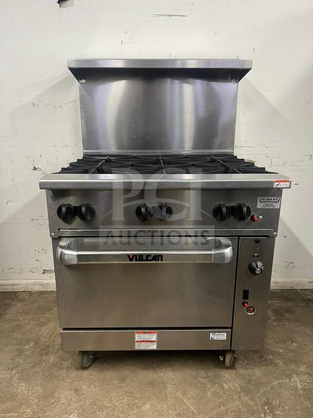VULCAN 36S-6B 36" gas range with 6 burners and standard oven, natural gas. Stainless steel, good condition, VULCAN logo visible.
