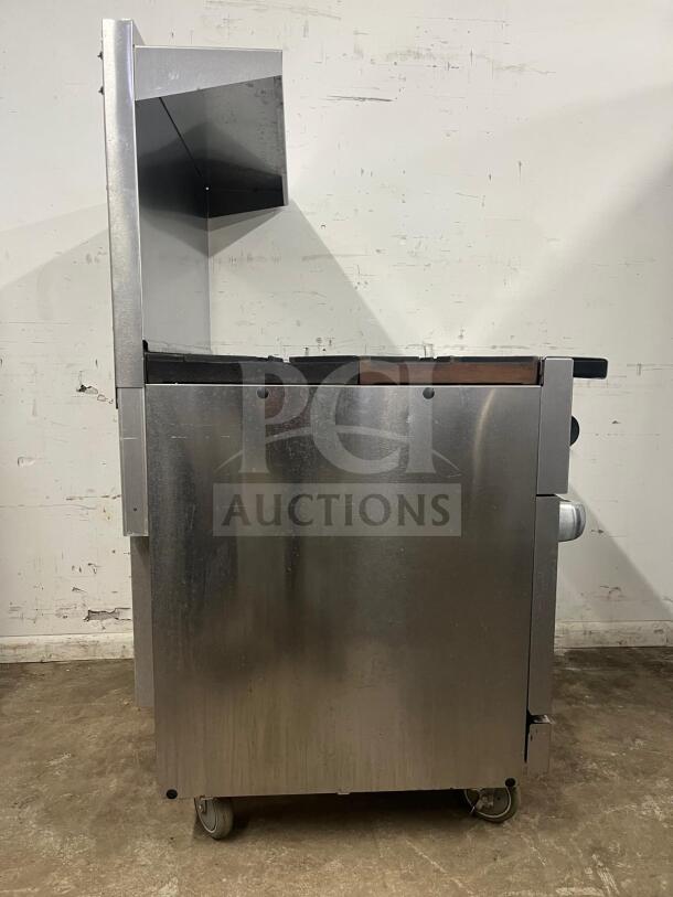 VULCAN 36S-6B 36" gas range, 6 burners, standard oven, stainless steel, natural gas, on wheels, side view.